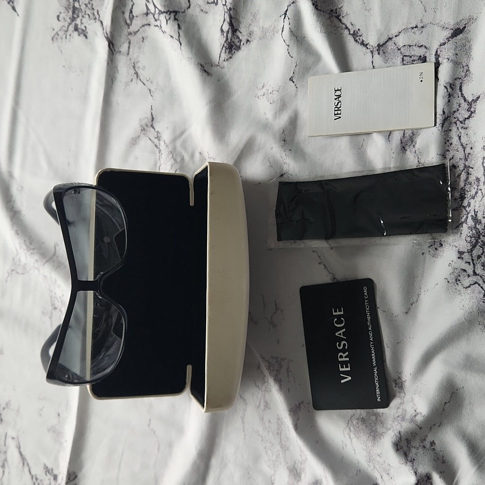 Versace sunglasses with authentication card and box